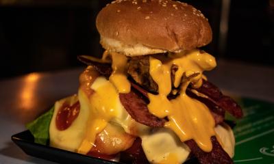 This Has Got to Be The Cheesiest Grilled Burger in Town! - Munch by WORLD OF BUZZ