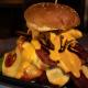 This Has Got to Be The Cheesiest Grilled Burger in Town! - Munch by WORLD OF BUZZ